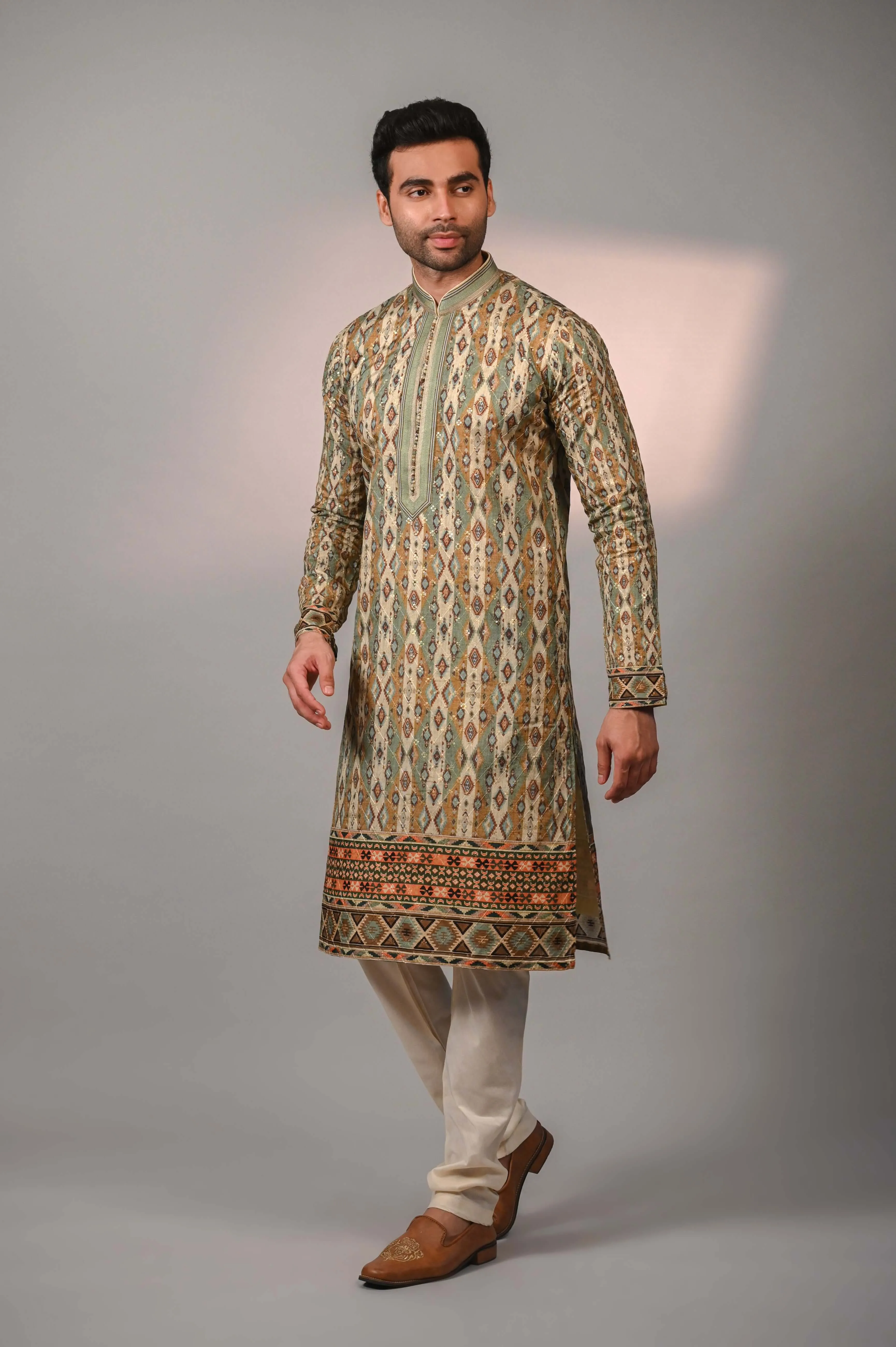 Beige Kurta with Churidar in Printed and Sequence Work